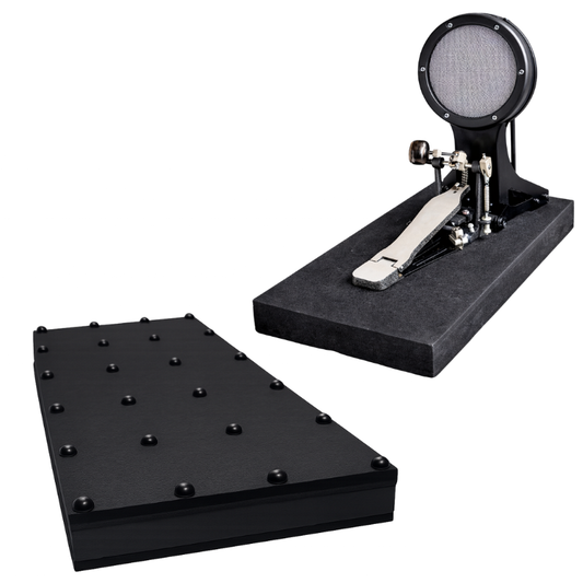 Kick pedal and isolation pad for reducing electronic drum noise in apartments.