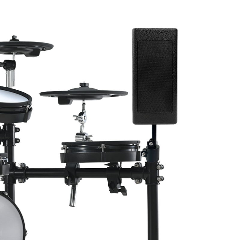 Electronic drum set with a speaker on a white background